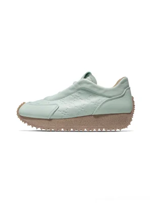Mint green embossed retro runner chunky platform sneakers with gum rubber outsole side view