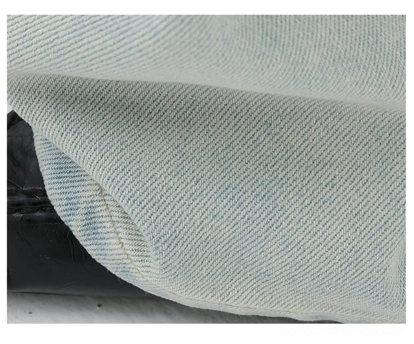 Embroidered light blue wide-leg denim streetwear pants with a soft faded wash and comfortable everyday fit