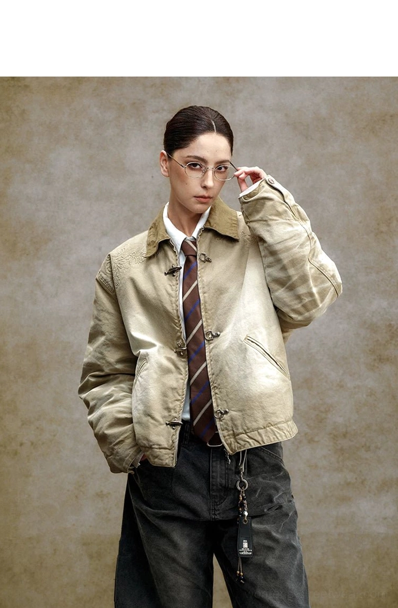 Embroidered toggle front utility jacket product image showcasing relaxed cotton streetwear workwear design