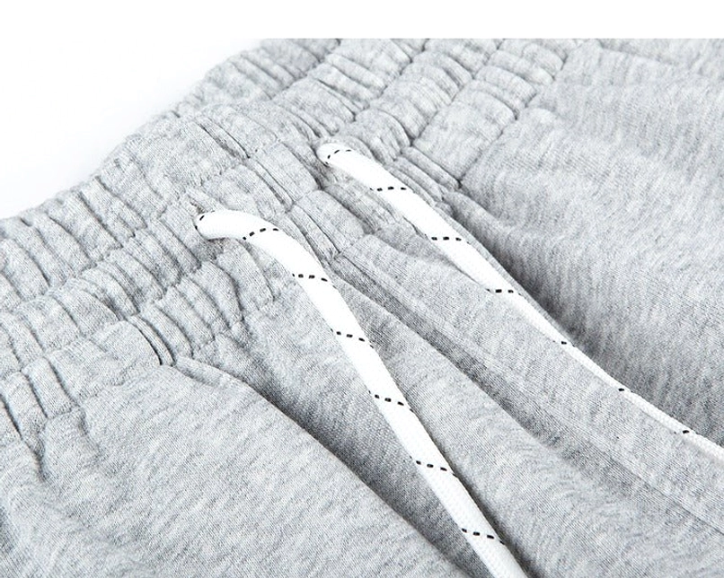 Comfortable oversized sweat shorts with adjustable drawstring waist and practical side pockets