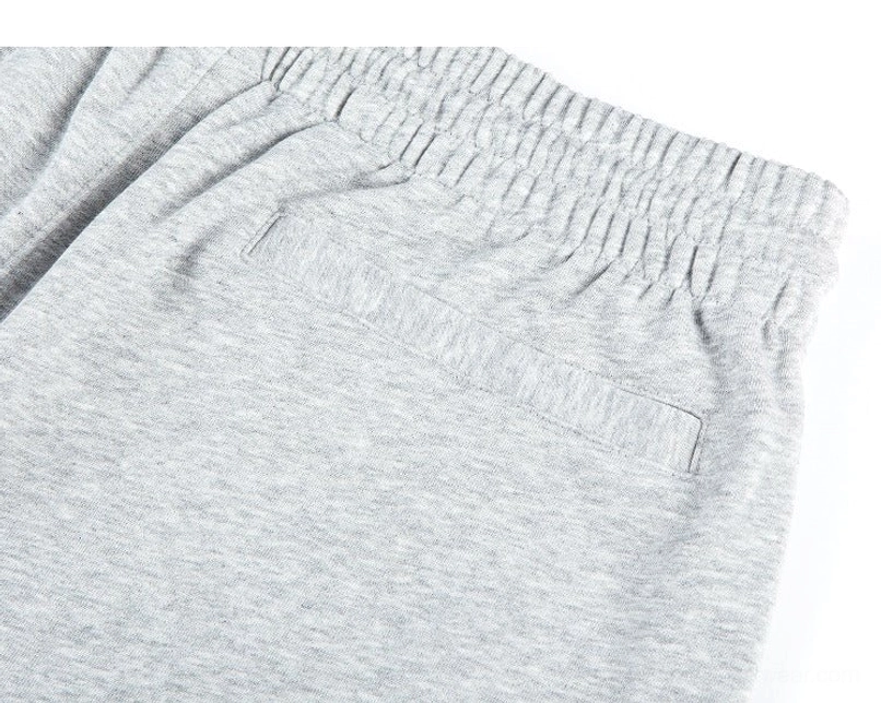 Versatile unisex sweat shorts for casual summer outfits, athleisure styling, and urban streetwear wardrobes