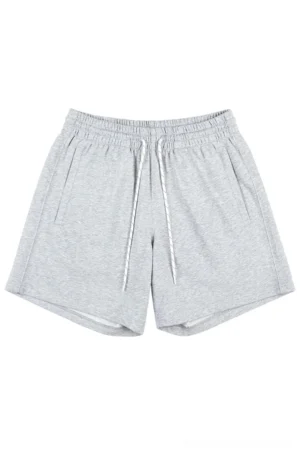 Heather gray oversized cotton sweat shorts with elastic drawstring waist and side pockets for casual streetwear