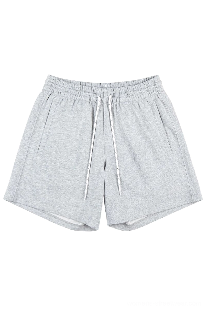 Heather gray oversized cotton sweat shorts with elastic drawstring waist and side pockets for casual streetwear