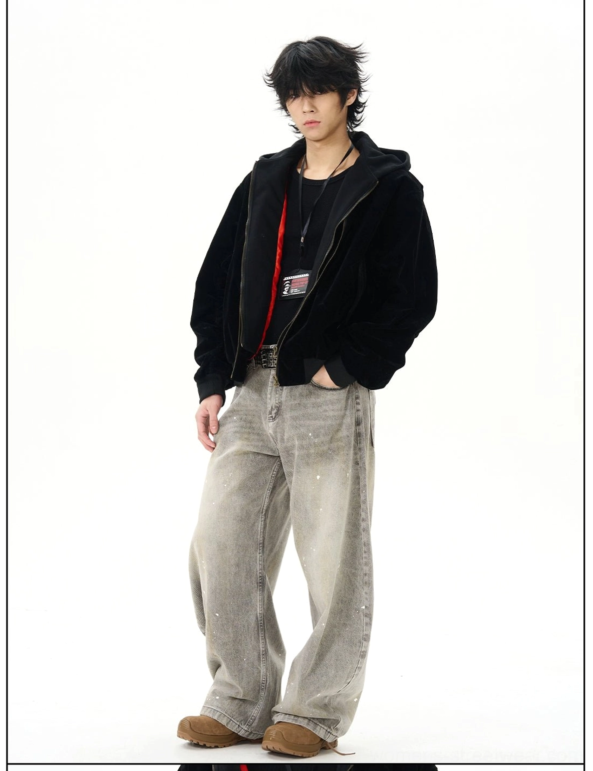 Side view of faded gray paint splatter ultra wide leg denim jeans with relaxed curved silhouette