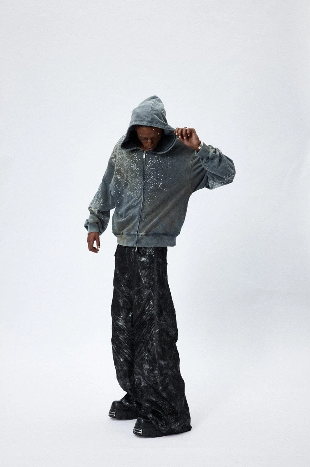Front side styling view of faded grey starlight crystal zip hoodie with full zipper and upper body rhinestones
