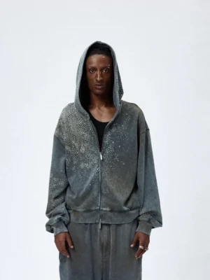 Front view of faded grey starlight crystal zip hoodie with star rhinestones on the chest and upper sleeves