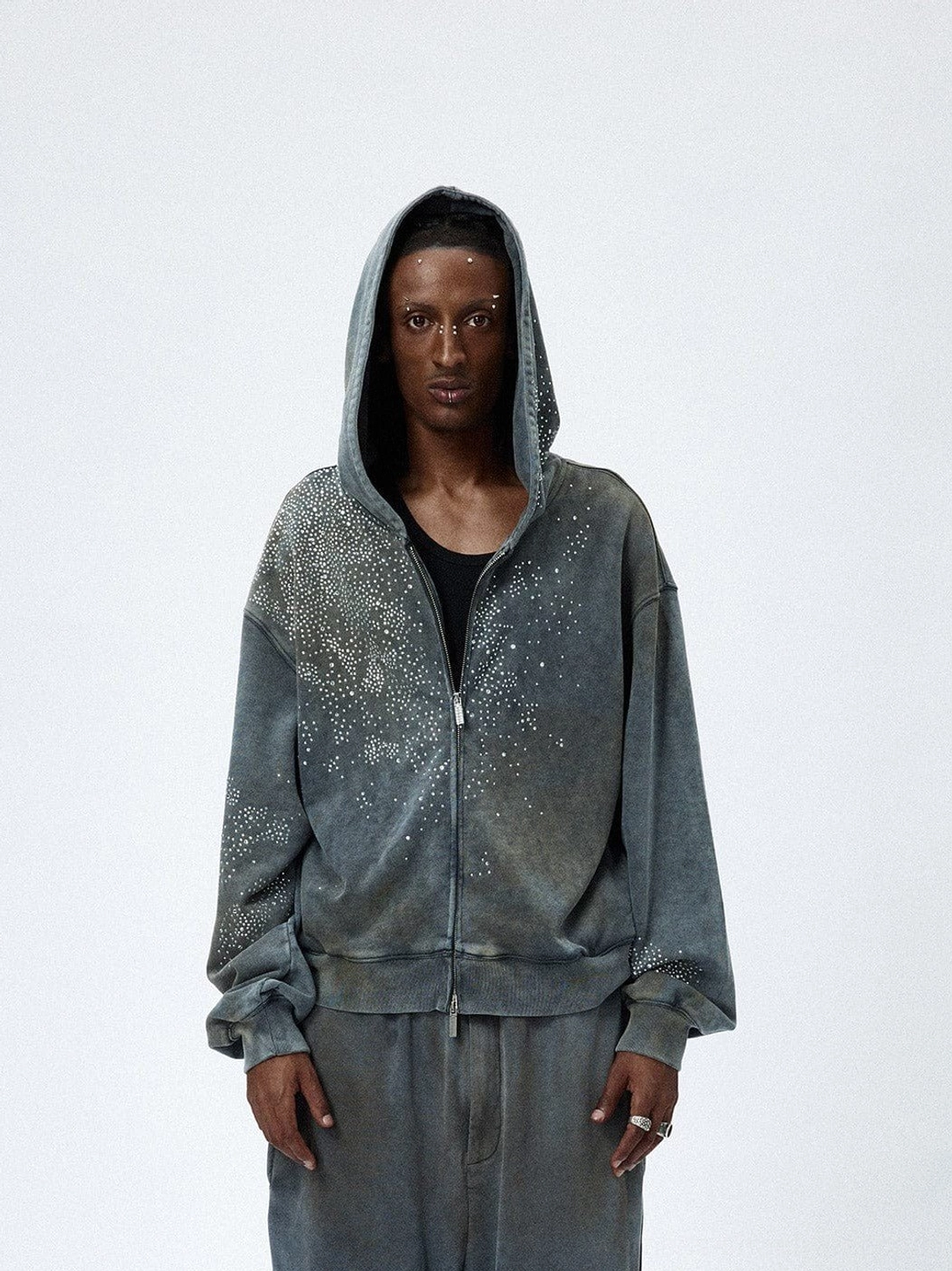 Front view of faded grey starlight crystal zip hoodie with star rhinestones on the chest and upper sleeves