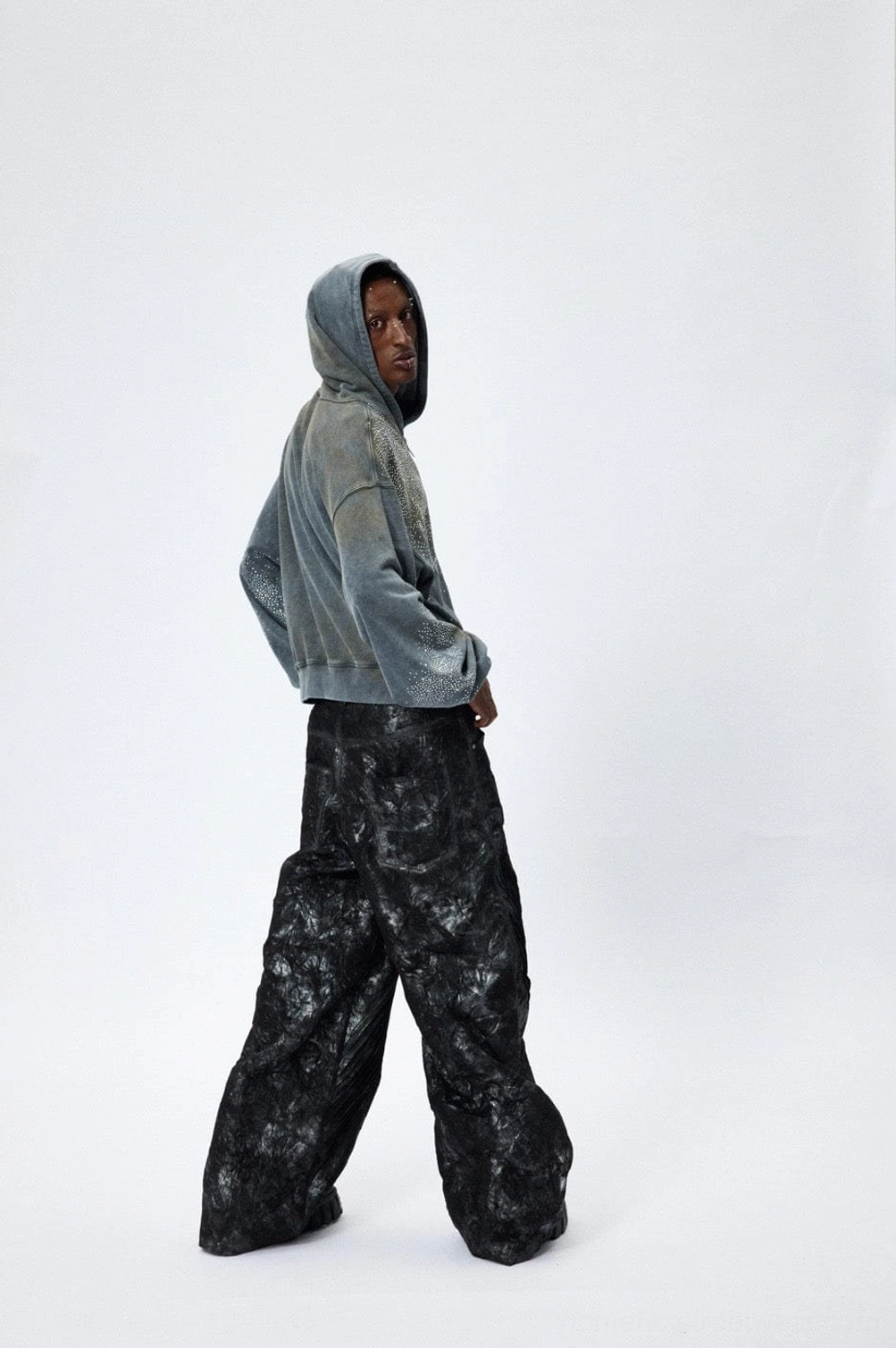 Relaxed cropped fit faded grey starlight crystal zip hoodie shown from the rear side with pulled up hood