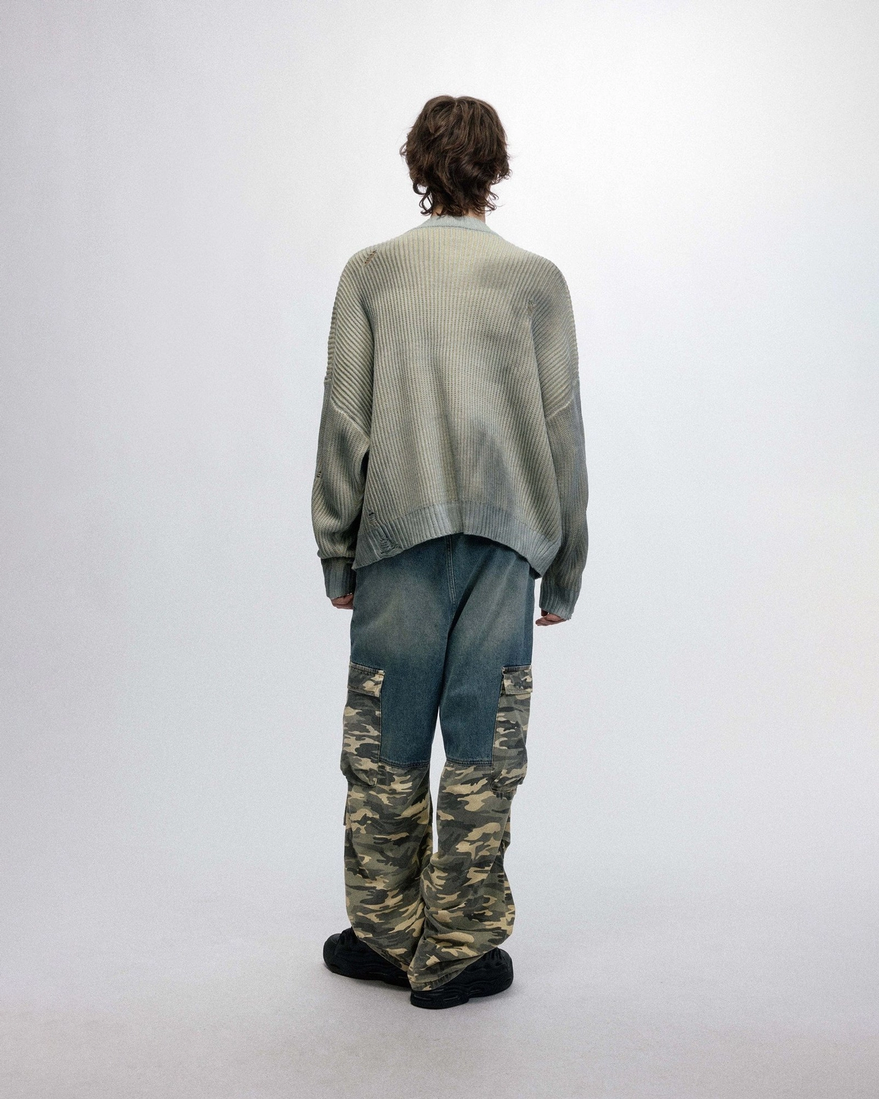 Faded ribbed streetwear sweater with minimalist chest logo and relaxed oversized silhouette