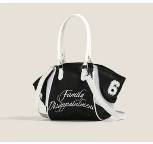 Black Family Disappointment varsity bowling tote bag front view with white handles, white shoulder strap, cursive embroidered lettering, and varsity number patch