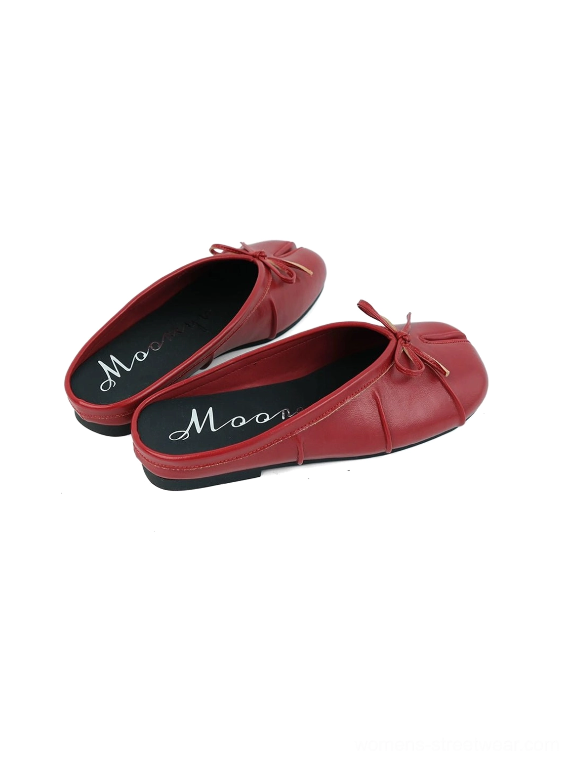 Fashion flat mules with split tabi toe, bow straps, open heel, and sleek contemporary streetwear styling