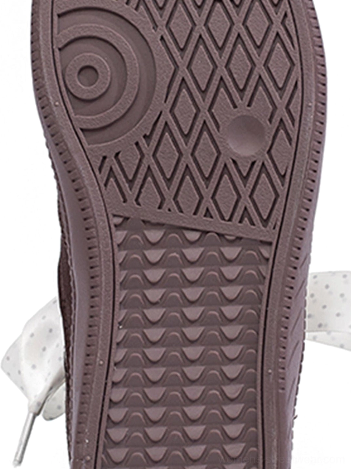 Fashion-forward low top ribbon sneakers combining retro polka dot graphics with modern streetwear design