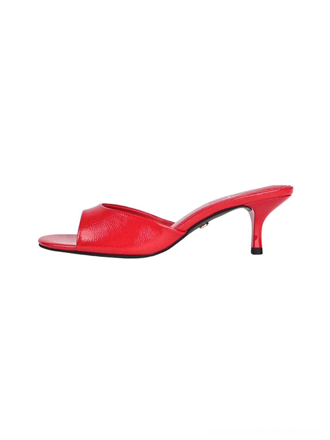 Fashion-forward patent mule heels with single toe strap and open back slip-on construction