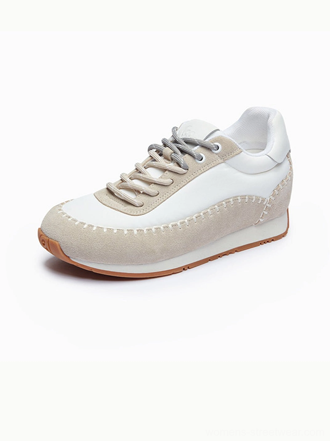 Fashion platform sneakers with visible contrast stitching, lace-up closure, two-tone panels, and Y2K streetwear appeal