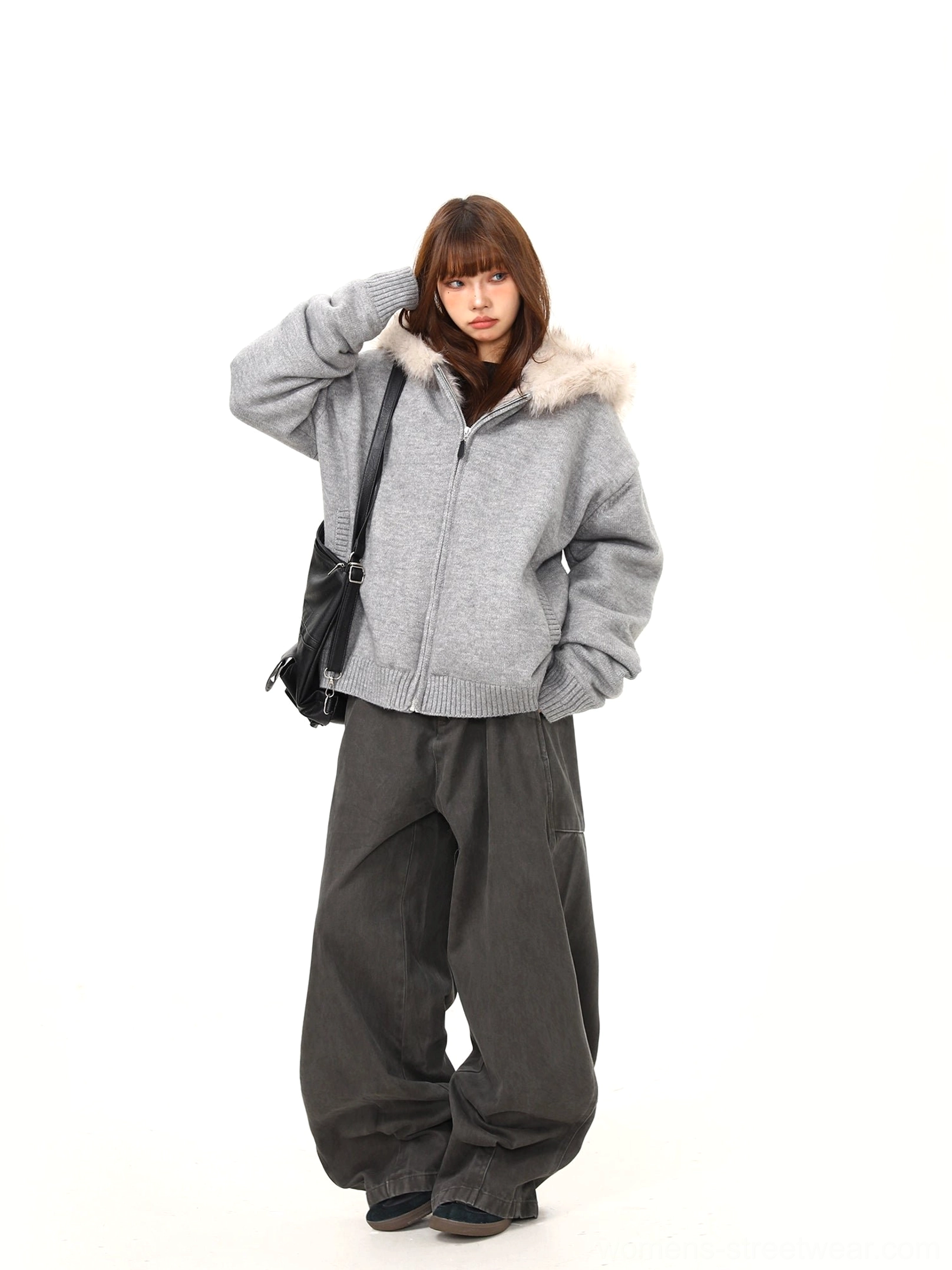 Women's gray faux fur hood oversized knit zip-up jacket back three-quarter view with wide-leg pants
