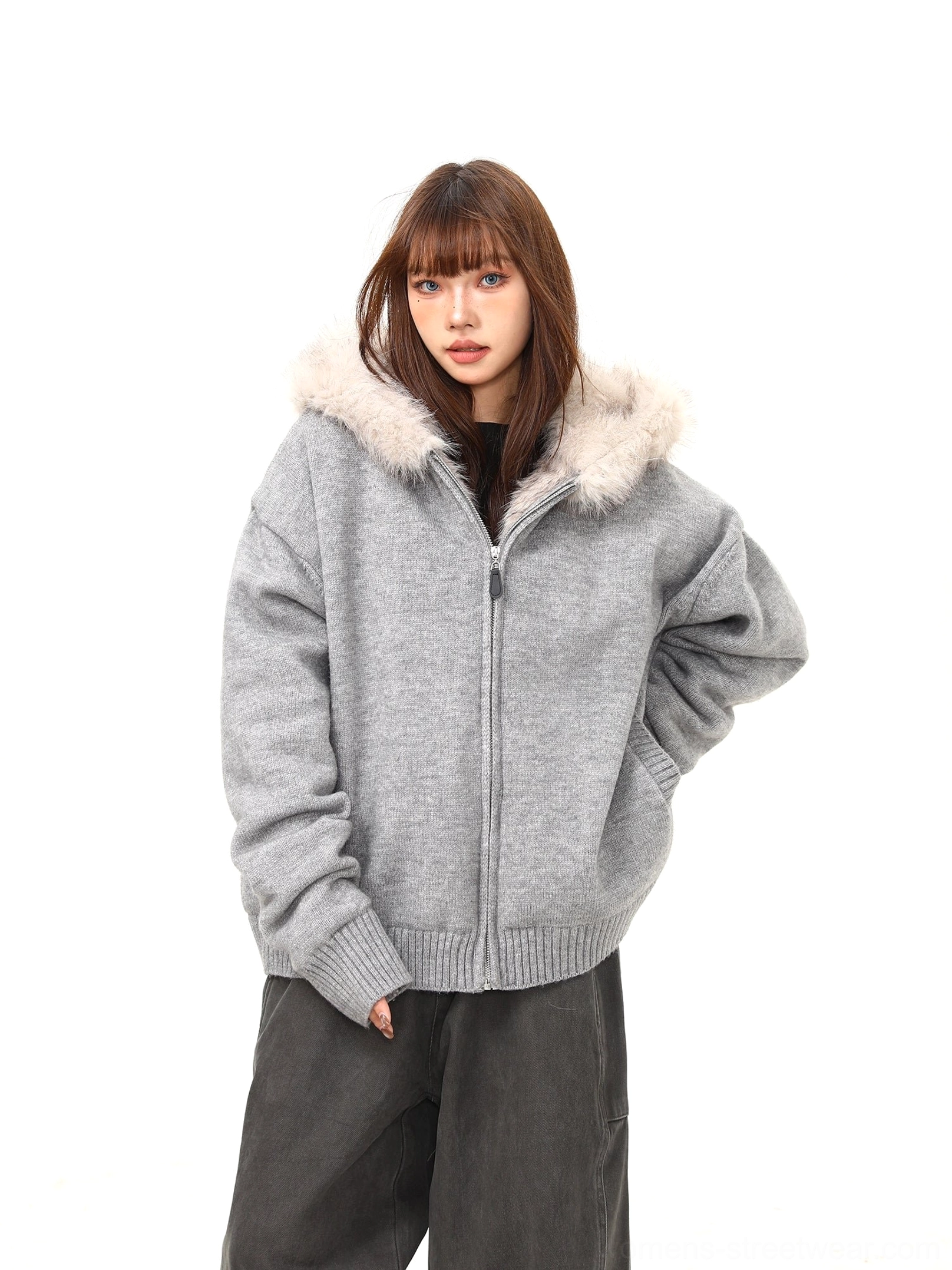 Women's oversized gray knit zip-up jacket with hand pocket, plush faux fur hood and dropped shoulders