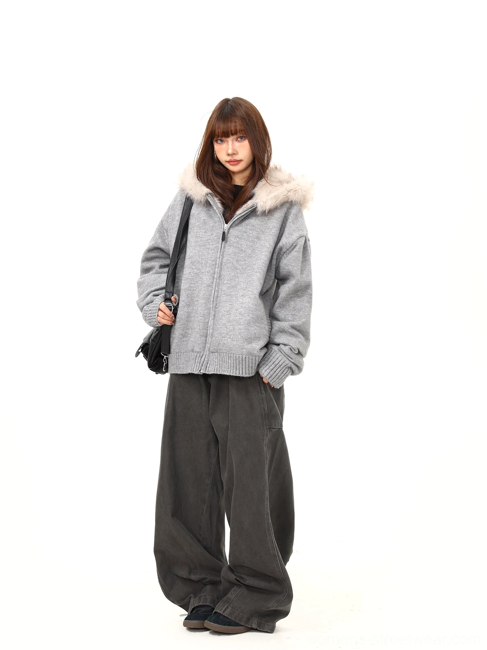Women's heather gray oversized knit hoodie jacket with fluffy faux fur trim shown from right side