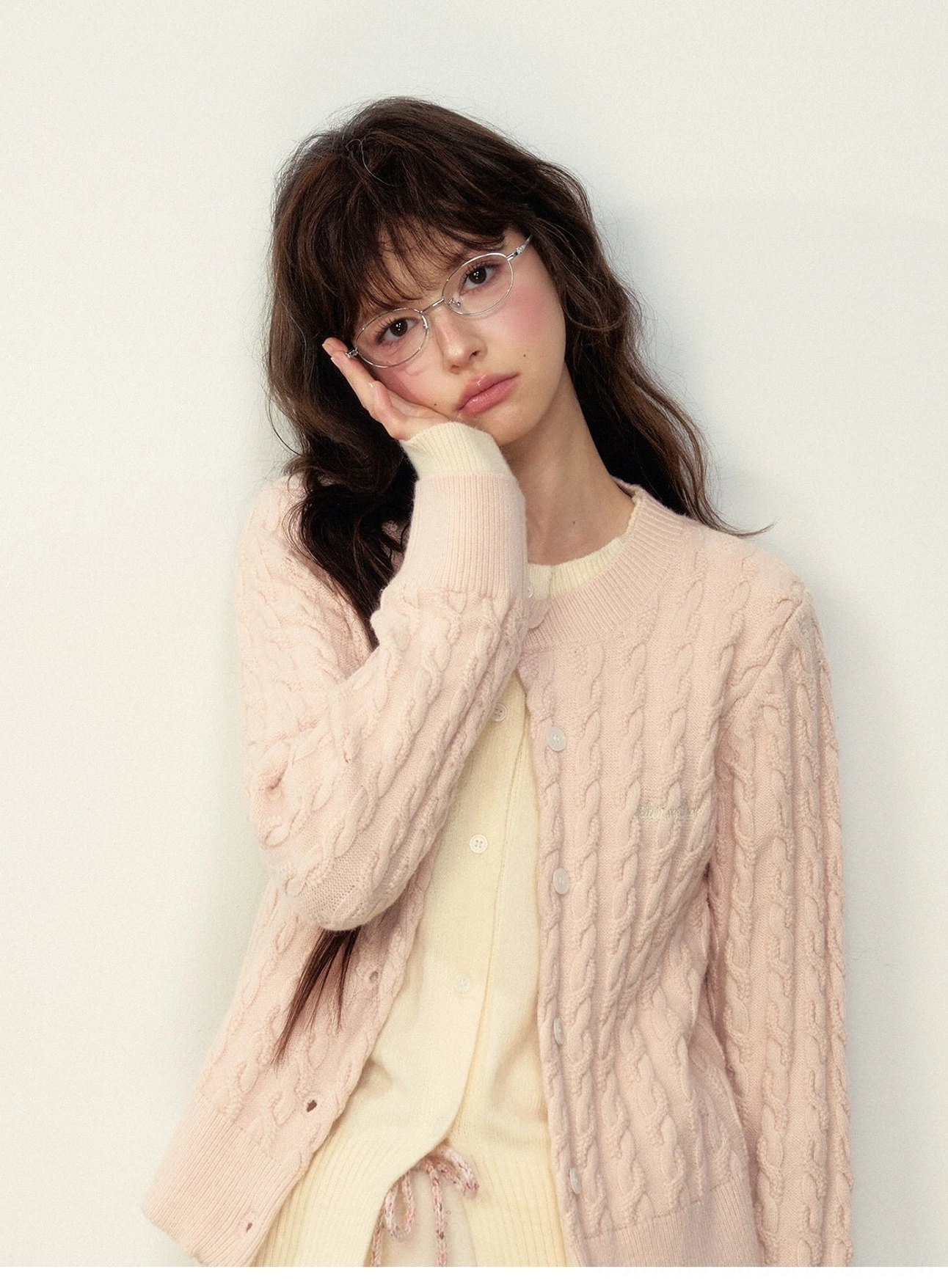 Fitted cable knit preppy cardigan for women with a classic button front Korean campus fashion silhouette