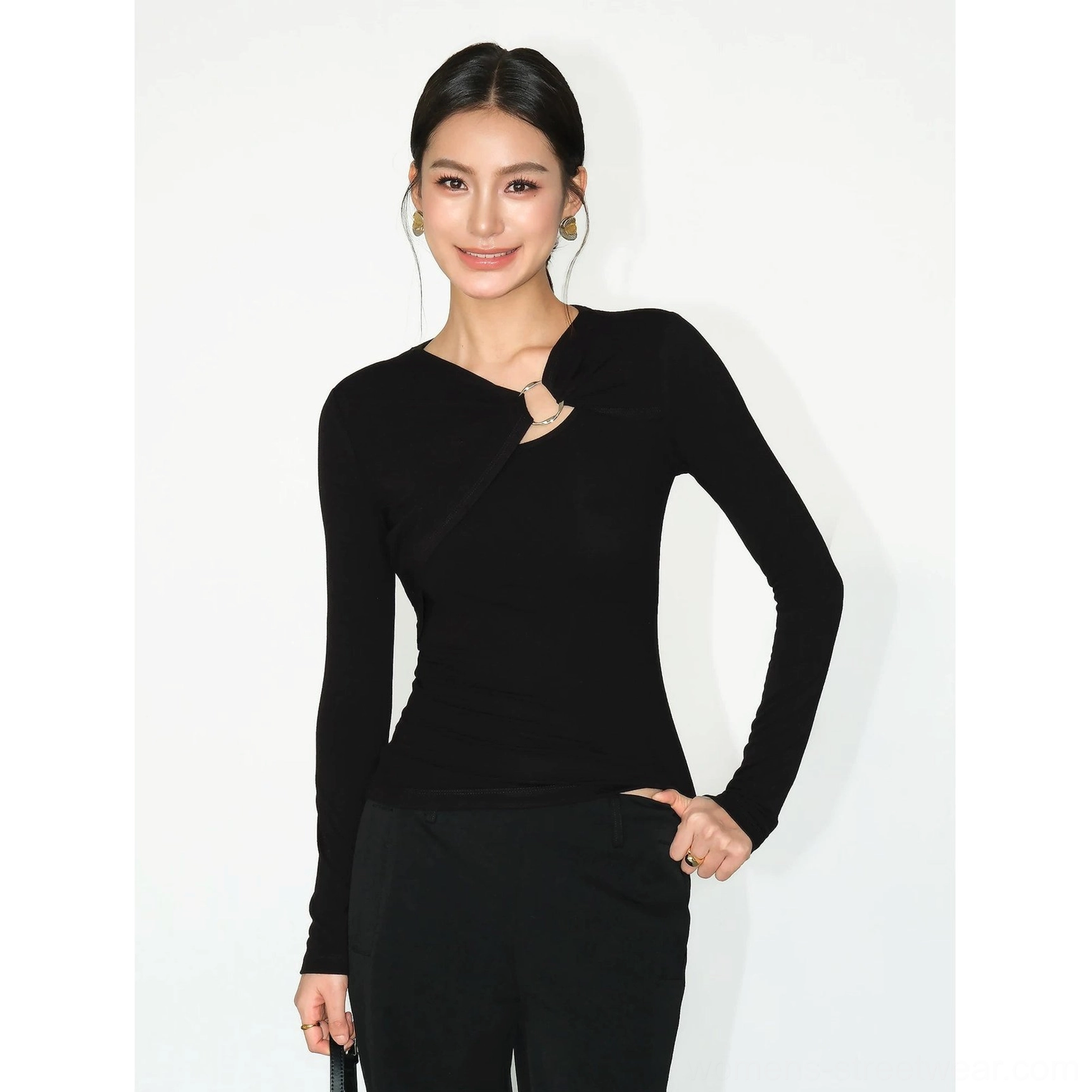 Fitted ring detail knit shirt with twist front design for modern avant garde womens streetwear