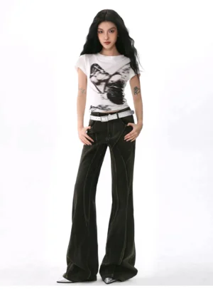 Fitted white butterfly print short sleeve T-shirt with black chest graphic styled with dark wash flared denim