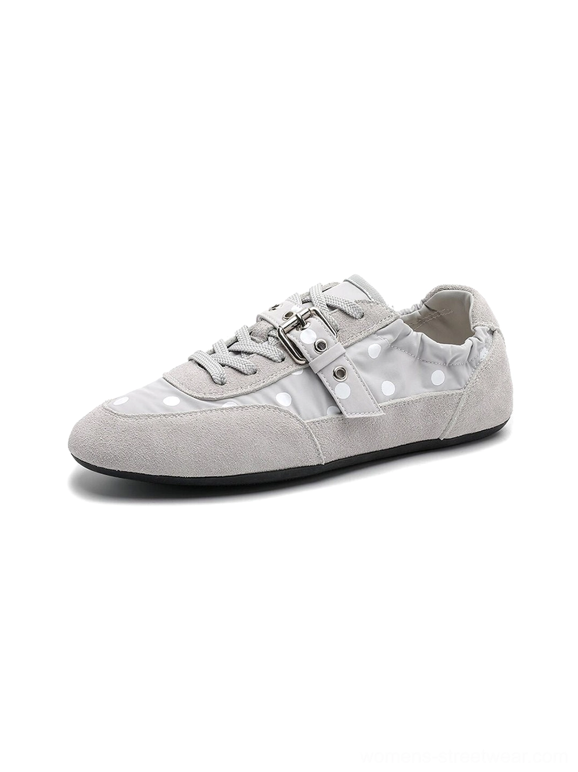 Flat polka dot ballet sneakers with slim buckle strap and versatile silhouette for skirts, trousers, and denim