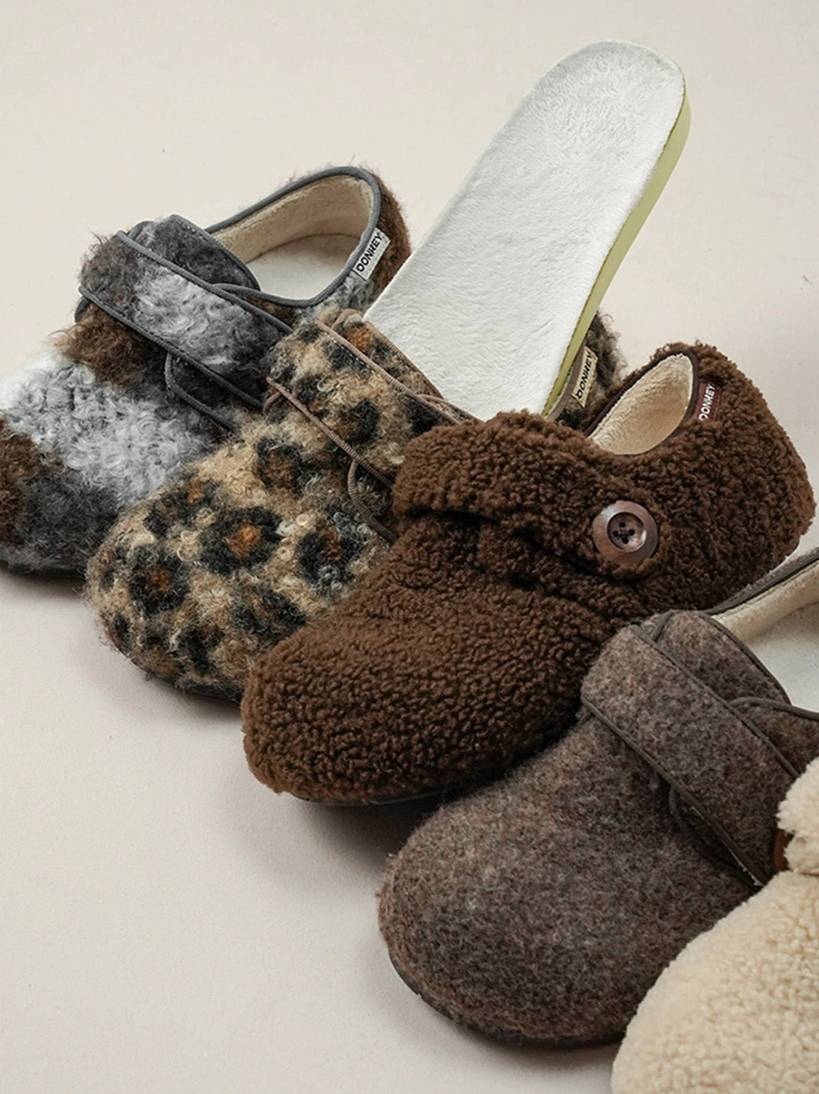 Fleece-lined faux fur slip-on shoes with wide Velcro closure cozy texture and versatile everyday city styling