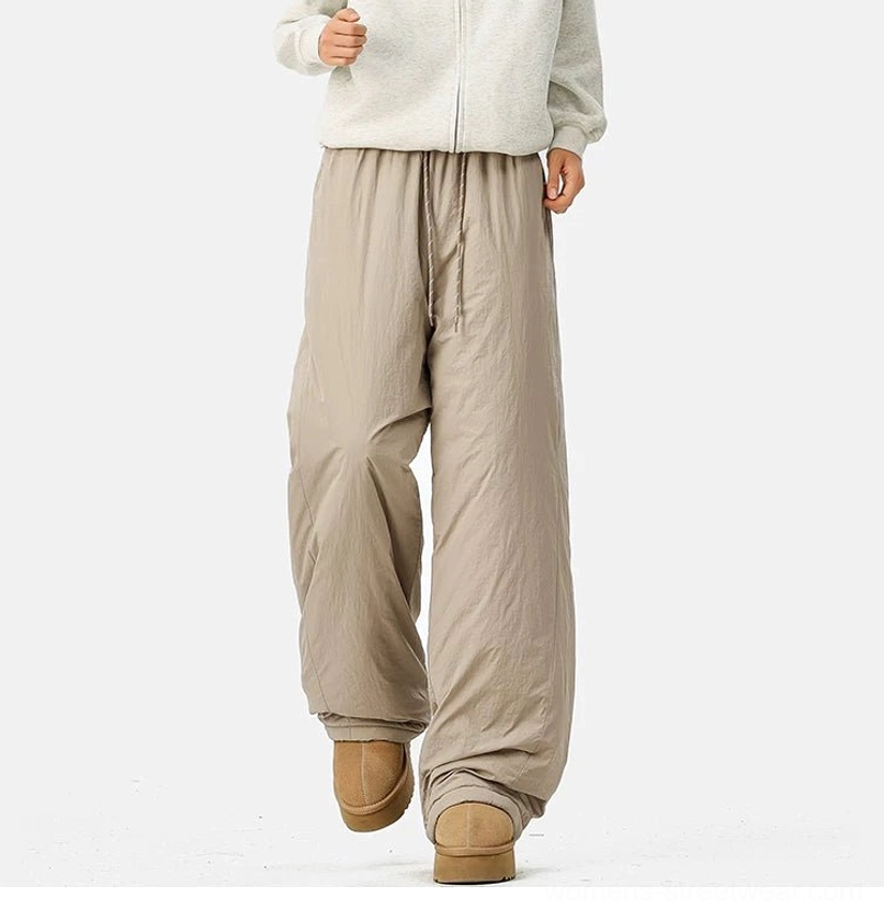Fleece-lined wide-leg pants with adjustable drawstring waist designed for cozy winter streetwear outfits