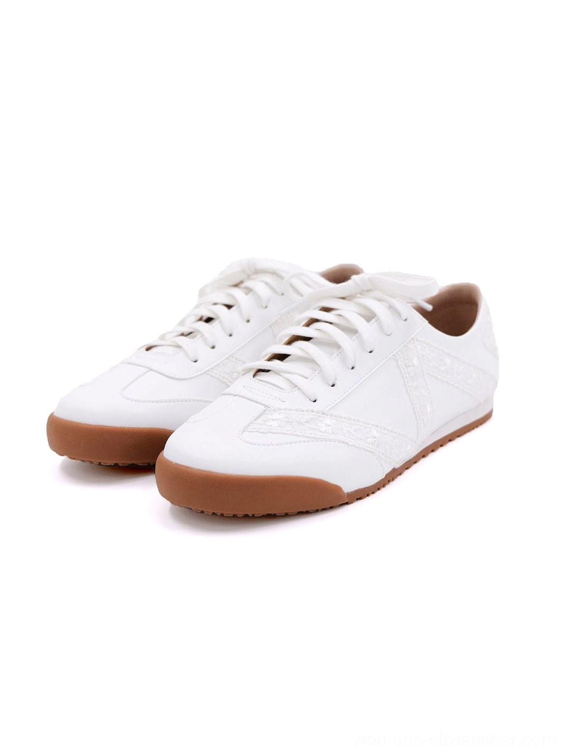 Floral lace microfiber leather low-profile sneakers with heel bows in a detailed product view