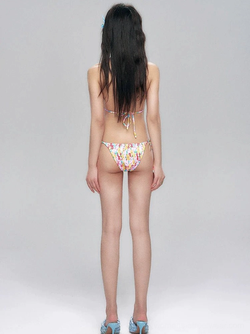 Back view of a floral print halter bikini set with tie-back straps and matching bottoms