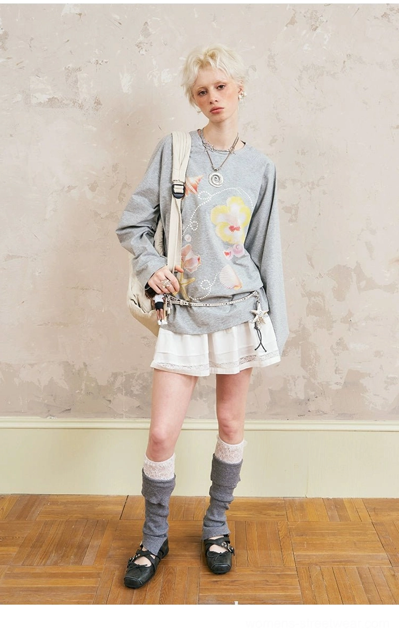 Light gray floral printed sweatshirt with white cargo mini skirt - loafers and knee socks styling aesthetic