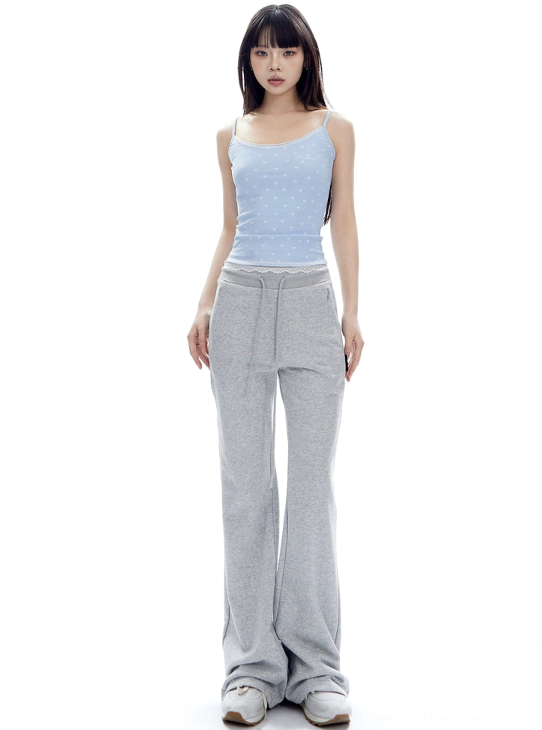 Flower Ash minimalist high-waist flared sweatpants shown from the front with a clean waistband and tidy long hem