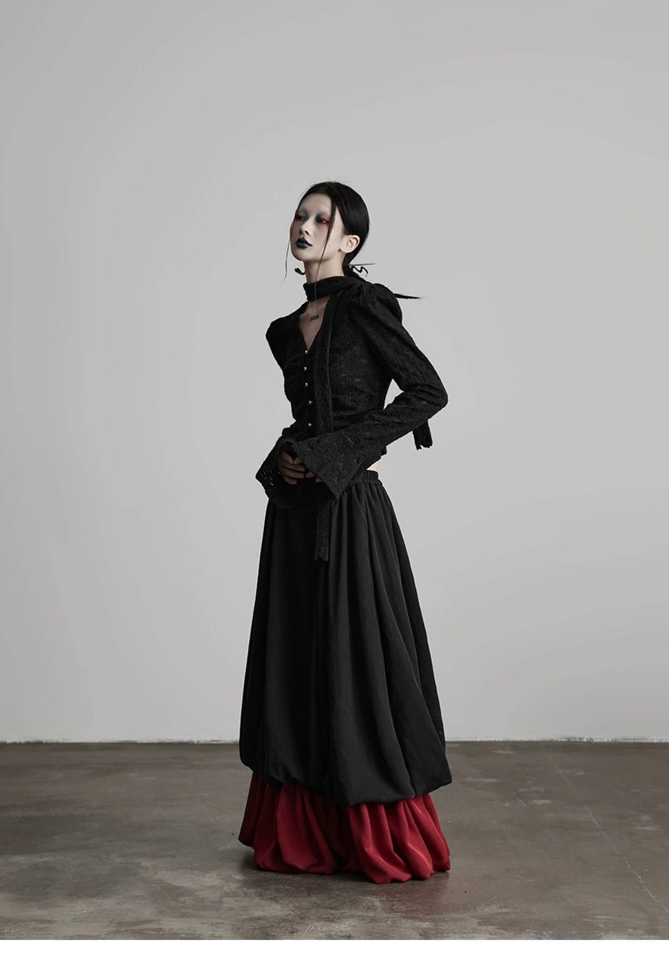 Flowing black and wine red A-line maxi skirt with gathered ruffle hem for alternative outfits
