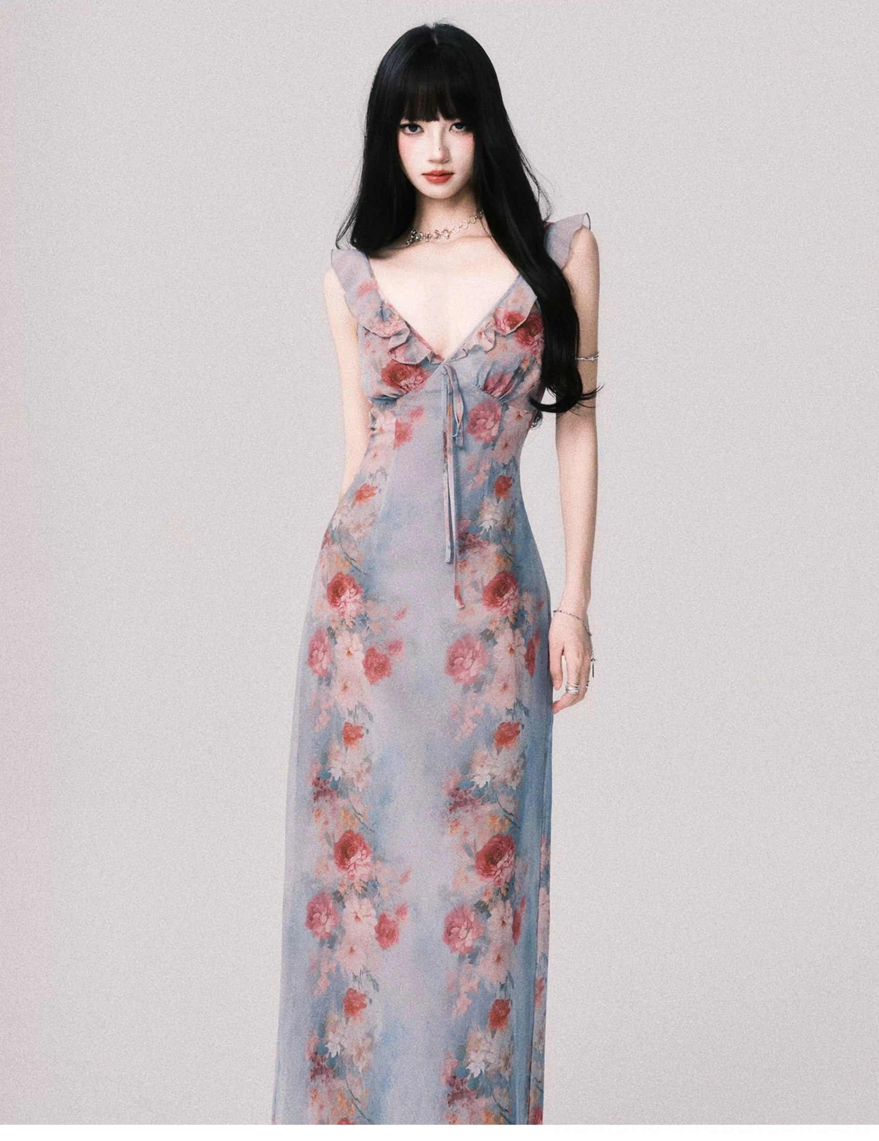 Foggy blue floral slip dress shown from the back with open V-shaped back neckline slim fit and all-over vintage rose print