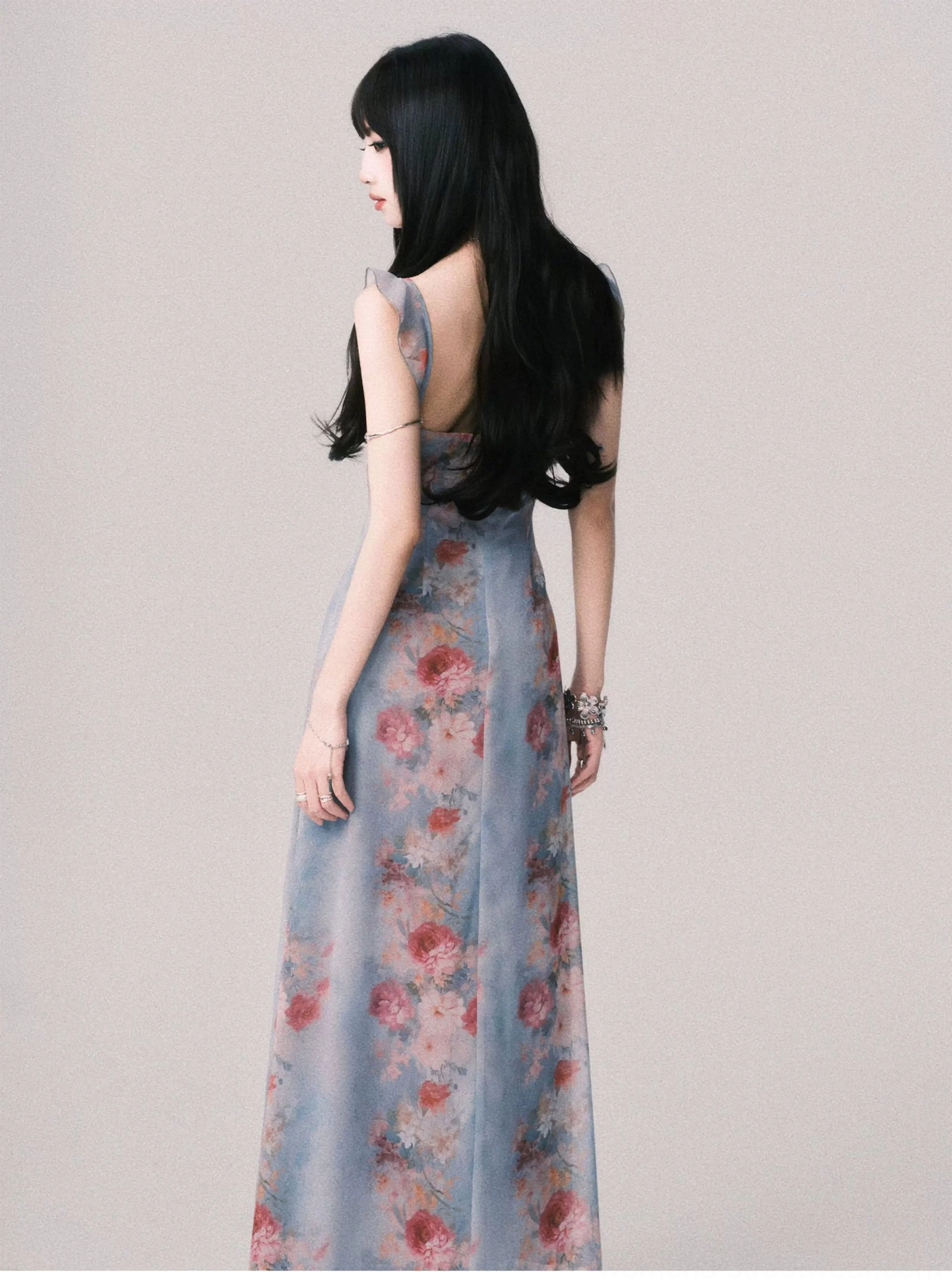 Foggy blue vintage floral maxi slip dress product image with deep V neckline front tie ruffled straps and flowing long skirt