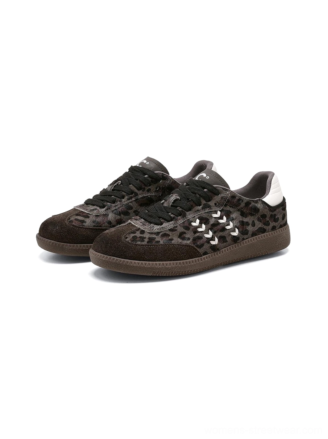 Pair of forest leopard print gum sole low top sneakers in an angled product display highlighting the textured pattern and retro streetwear silhouette