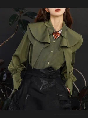 Dark green fox charm ruffle blouse with layered pointed collar and front buttons styled with a black high waist skirt