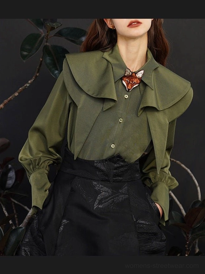 Dark green fox charm ruffle blouse with layered pointed collar and front buttons styled with a black high waist skirt