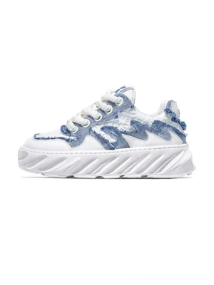 Blue and white frayed denim wave chunky sole streetwear sneakers shown in left side studio view