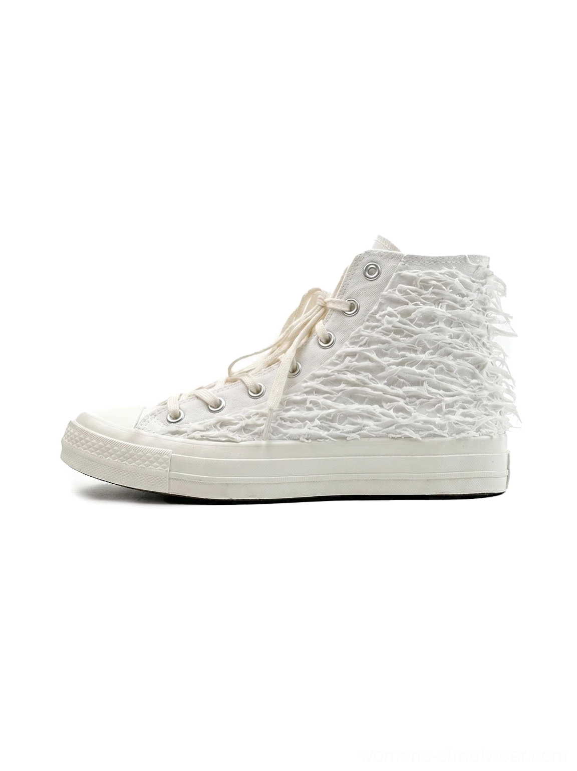 White fringed high-top canvas sneakers with textured tassel upper, rubber toe cap and lace-up streetwear design