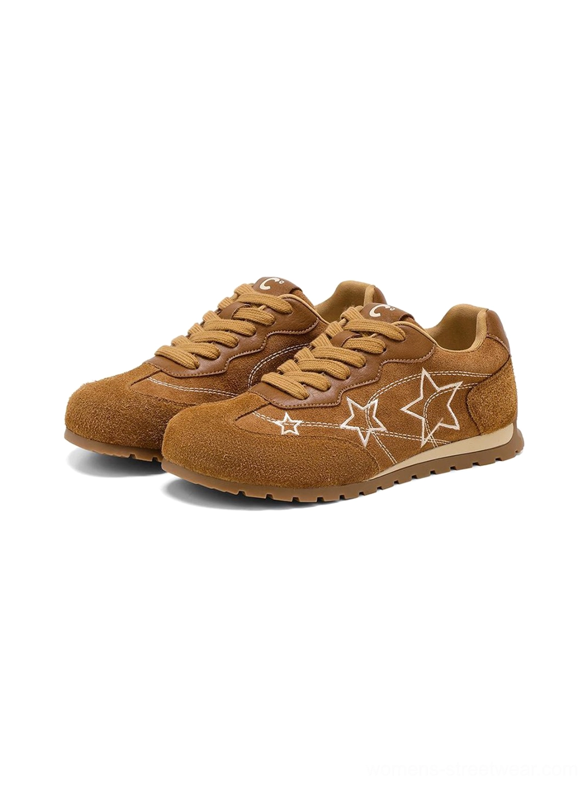 Front view of matching camel star embroidered low-top sneakers with neat lace eyelets and coordinated suede-look uppers