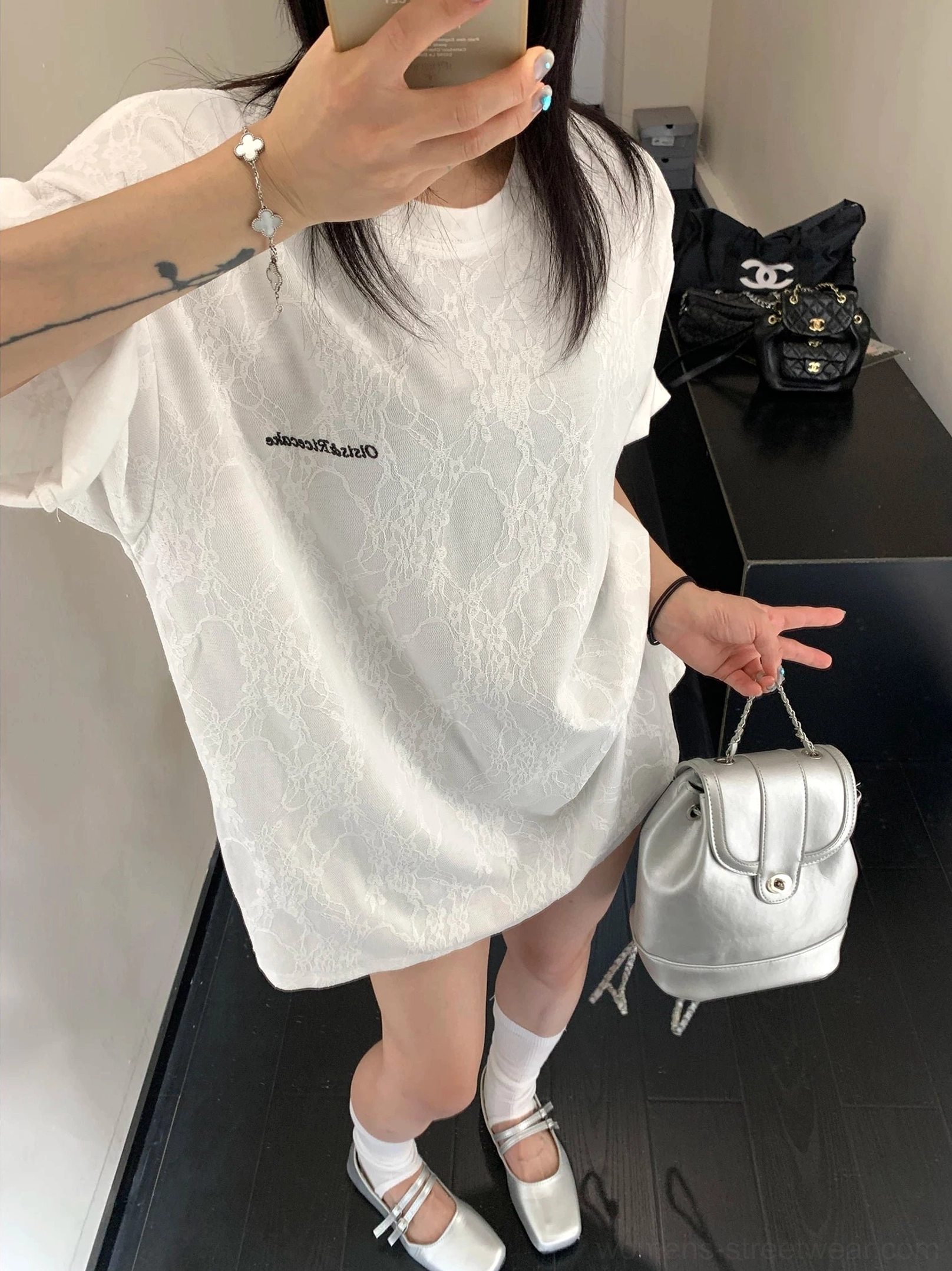 White lace texture oversized streetwear t-shirt styled with a silver crossbody bag and Mary Jane flats