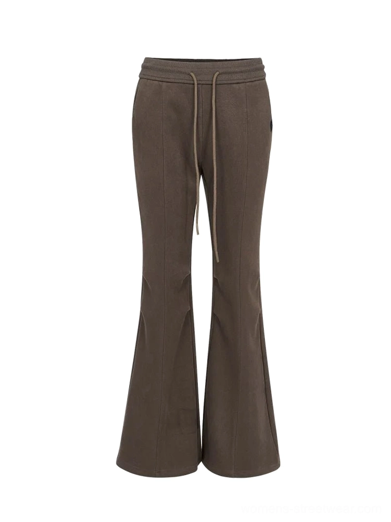 Full-length women's flared lounge pants showcasing a modern wide-leg silhouette for Y2K fashion outfits