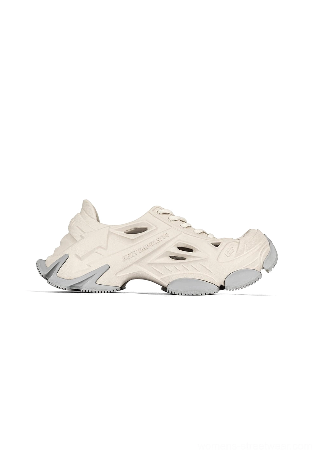 Side view of off-white futuristic platform clog showing hollow ventilation cuts and sculpted chunky outsole