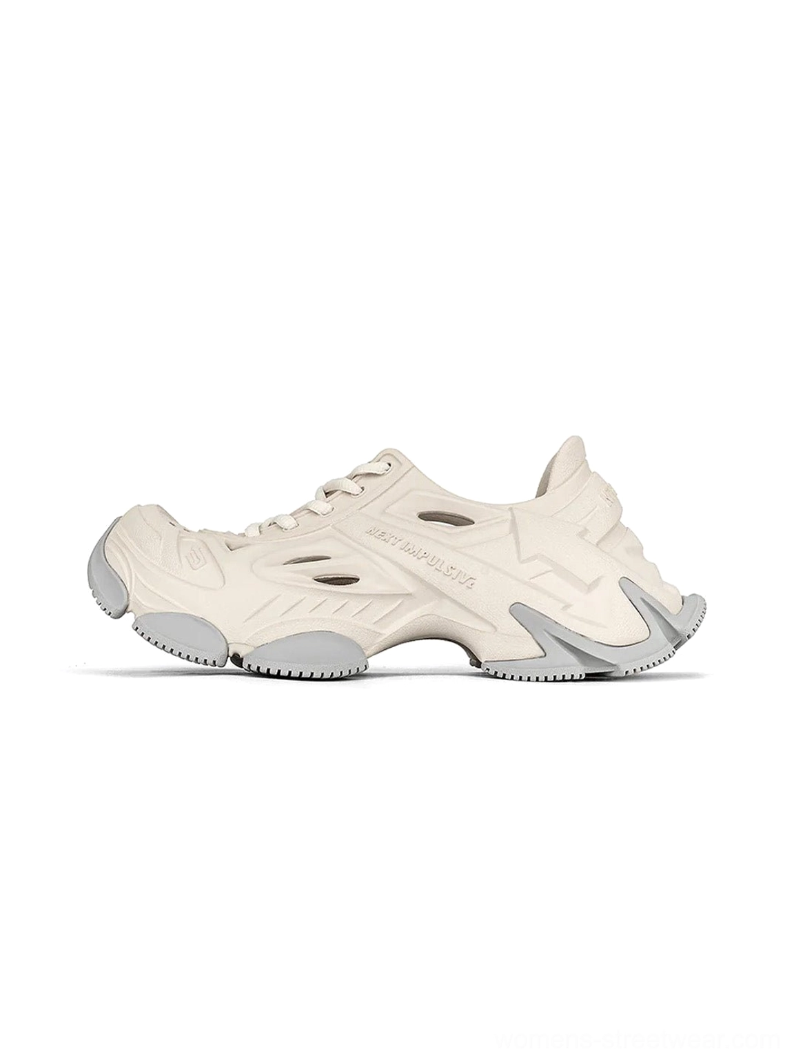 Off-white futuristic EVA platform clogs with ventilated side panels, lace-up front, and chunky grey streetwear outsole