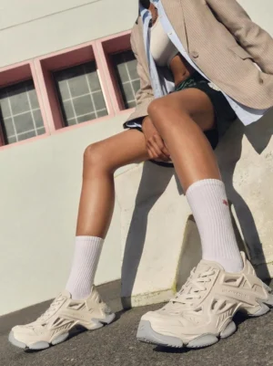 Off-white chunky EVA platform clogs styled with casual streetwear outfit and white crew socks