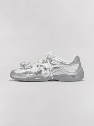 Galaxy silver ballet Mary Jane sneakers shown in side profile with metallic upper, bow laces, star ornament, breathable mesh panels, and low-profile sneaker sole