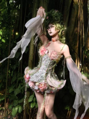 Side view of garden fairy floral corset mini dress set with ruffled skirt pink floral trim and sheer arm drapes