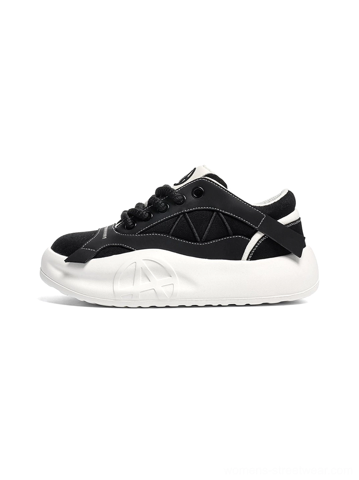 Gallery image associated with the black geometric panel platform runner sneakers, featuring their paneled streetwear design