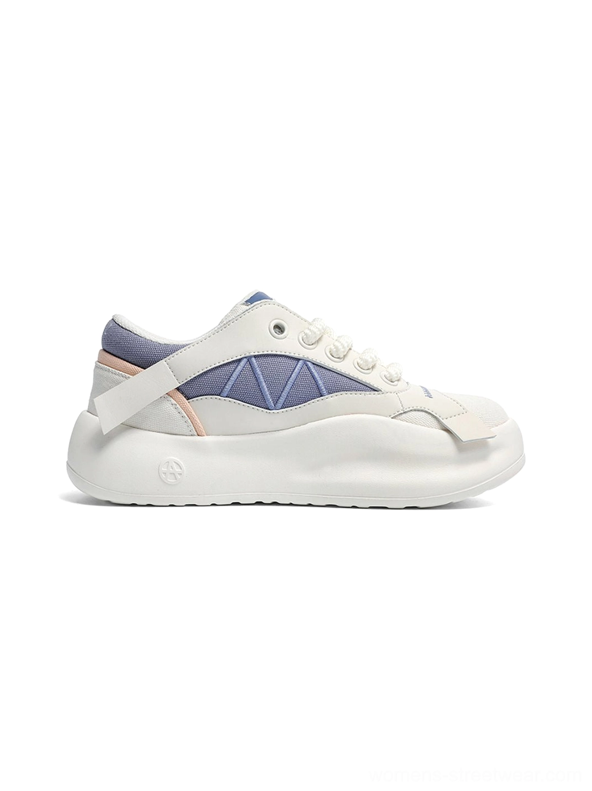 Right-side view of a geometric panel platform runner sneaker on a white background, highlighting the blue side panel and thick cream sole