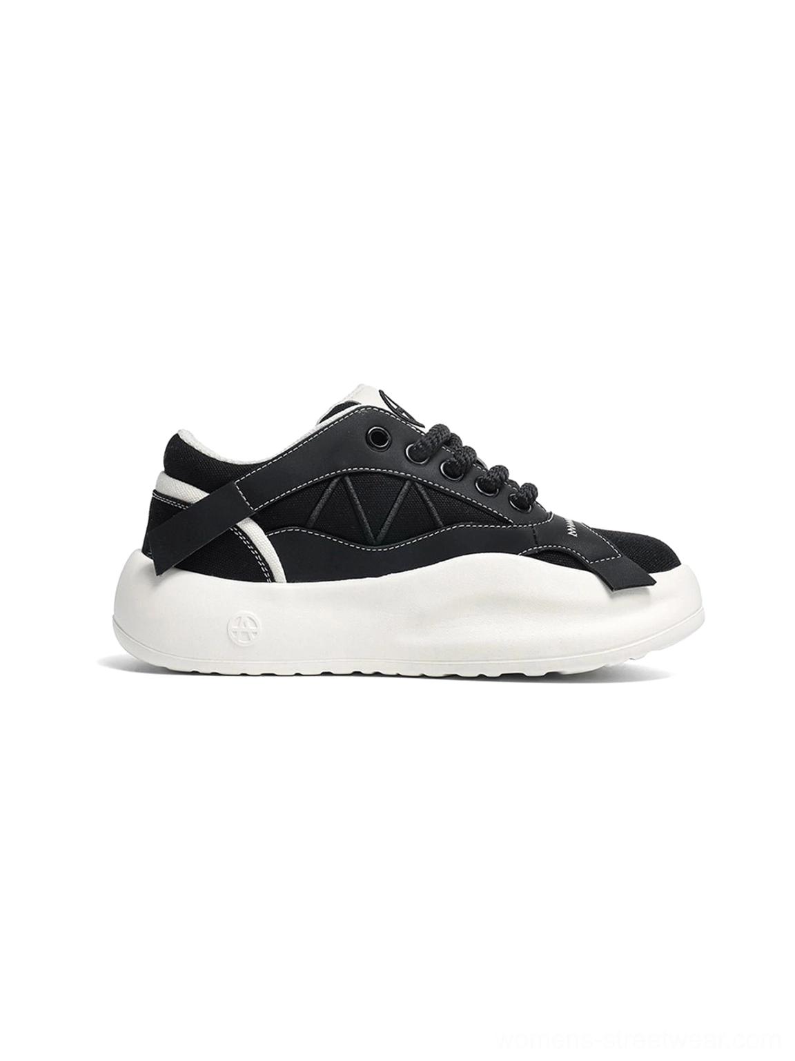 Additional view of the geometric panel platform runner sneakers and their layered low-top design